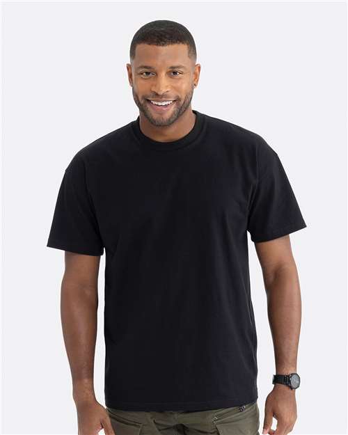 Next Level Unisex Heavyweight Tee — Black — On model · front