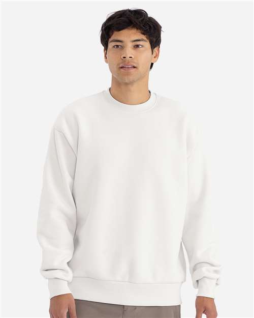 Next Level Unisex Heavyweight Crewneck Sweatshirt — Bone — On model · front