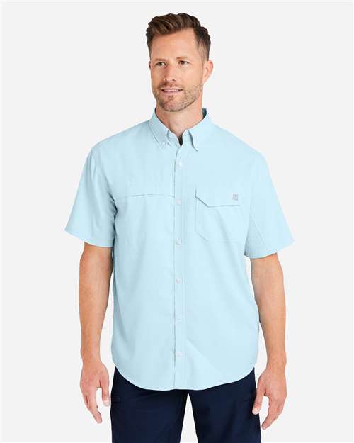 HUK Men's Tide Point Short Sleeve Shirt — Crystal Blue — On model · front