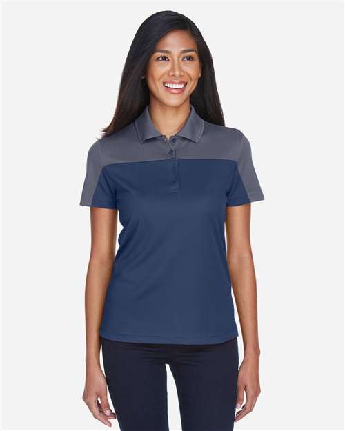 CORE365 Women's Balance Colorblock Performance Piqué Polo — Classic Navy/ Carbon — On model · front