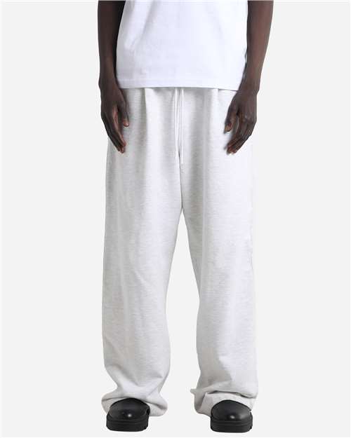 Shaka Wear Unisex Garment-Dyed Pleated Pants — Heather White — On model · front