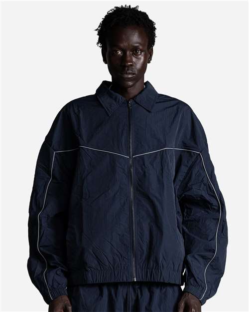 Shaka Wear Unisex Wind OPPS Reflective Jacket — Navy — On model · front
