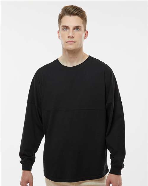 J. America Unisex Game Day Jersey Long Sleeve T-Shirt — Black — On model · front