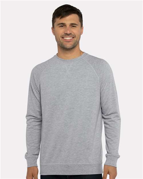 Next Level Unisex Laguna Raglan Crewneck Sweatshirt — Heather Grey — On model · front
