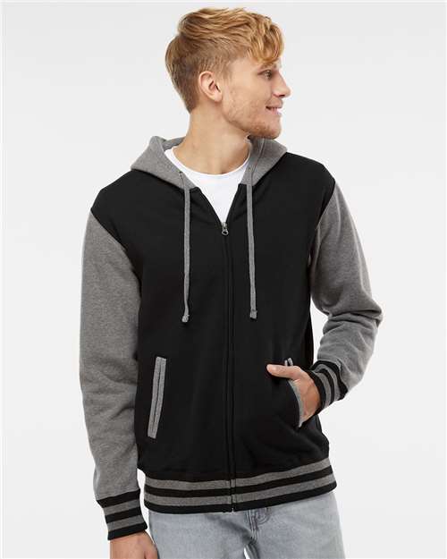 Independent Trading Co. Unisex Heavyweight Varsity Full-Zip Hooded Sweatshirt — Black/ Gunmetal Heather — On model · front